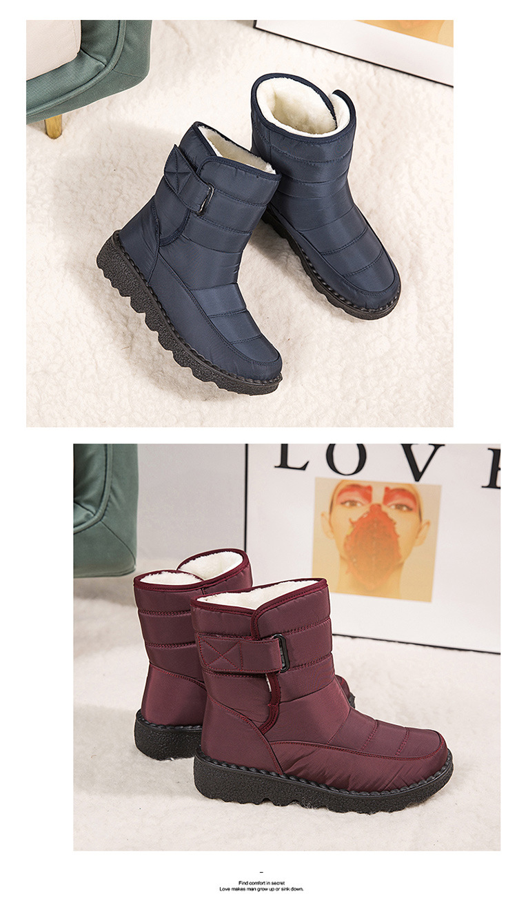 Quilted winter ankle boots in navy with plush lining and buckled straps