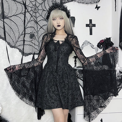 Black lace fitted crop top with long flared sleeves and bow-like neckline trim