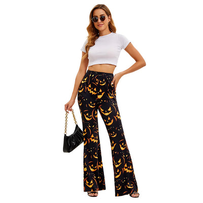 Women’s bell-bottom Halloween trousers, black base with orange jack-o’-lantern pattern