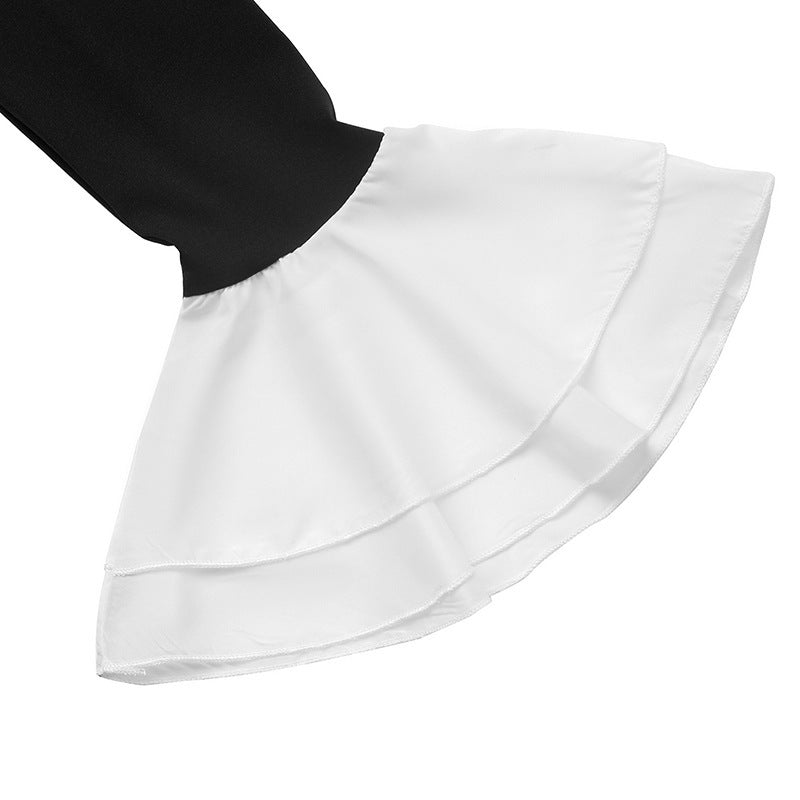 White tiered ruffle hem on a black and white mini dress