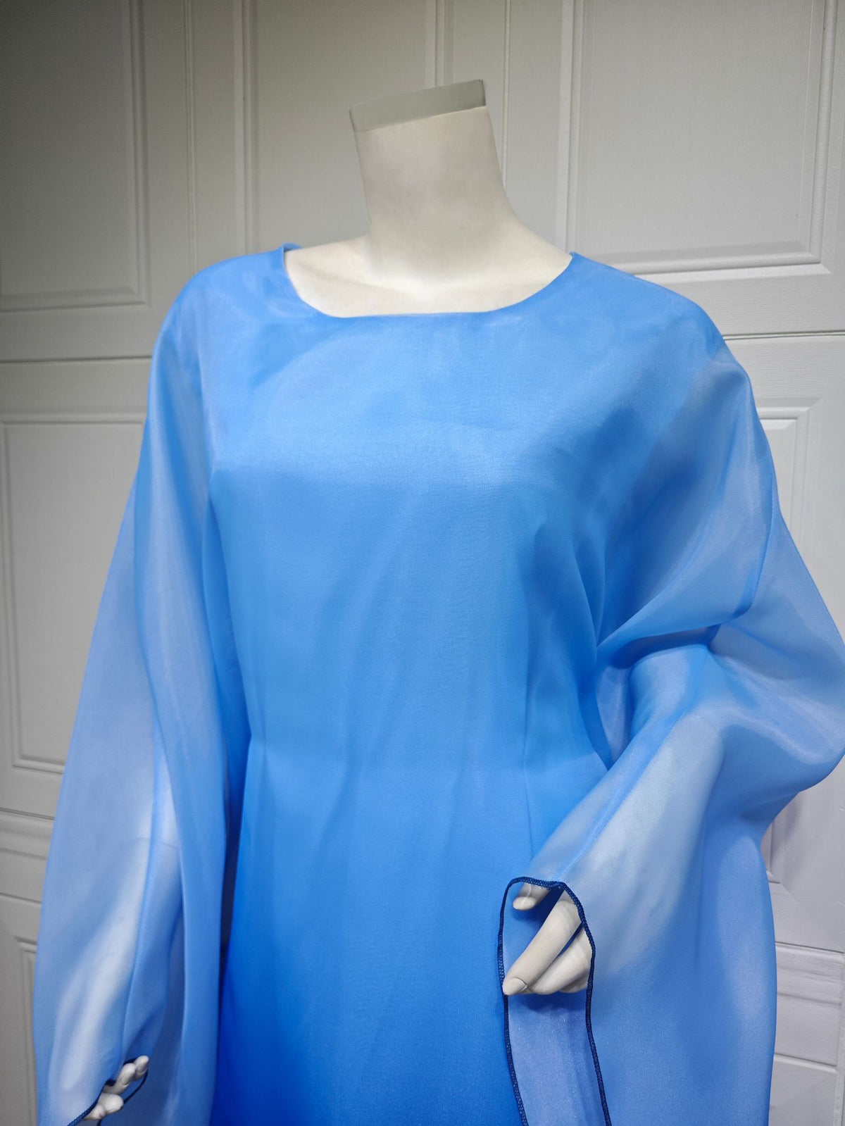 Ombre satin maxi dress with sheer draped batwing sleeves, light blue ombre