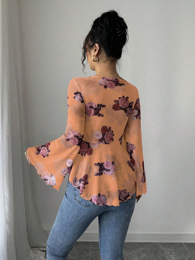 Apricot floral bow-front blouse with long flared bell sleeves