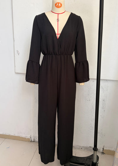 V-neck wide-leg jumpsuit in black with gathered waist and bell-style flared sleeves