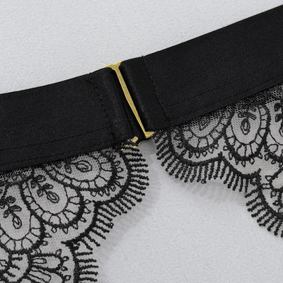 Black waistband band with gold-tone buckle and lace-trim edge