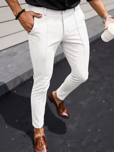 Men's slim-fit white dress pants with front seams and tapered cropped leg