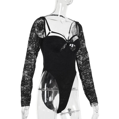 Black bodysuit with long lace sleeves and strappy cutout chest.