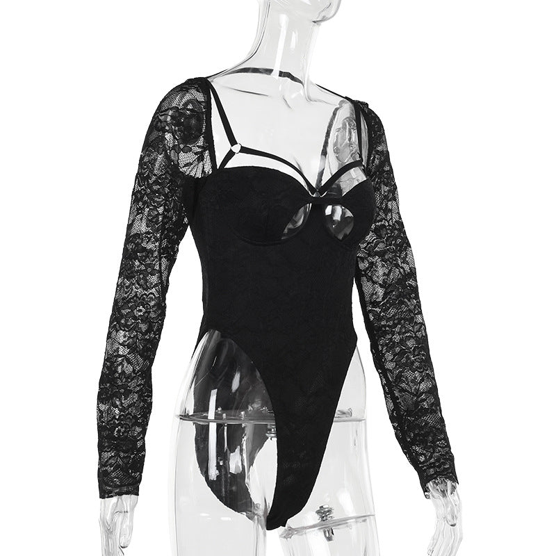 Black bodysuit with long lace sleeves and strappy cutout chest.