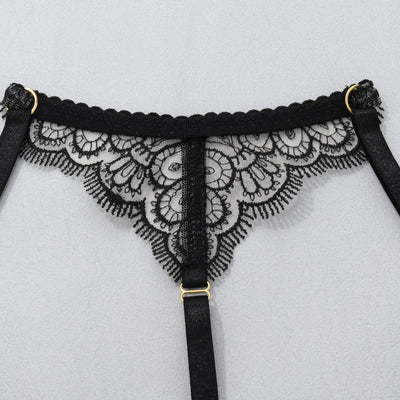 Black lace garter thong with central vertical strap and adjustable buckle