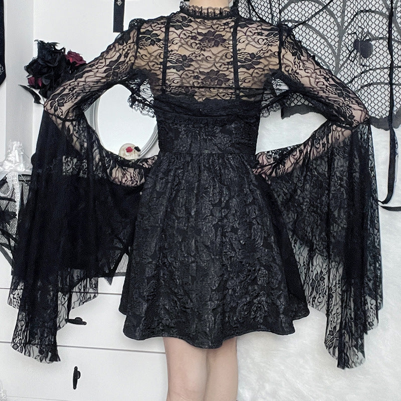 Black lace crop top with open long sleeves and fitted bodice with front tie