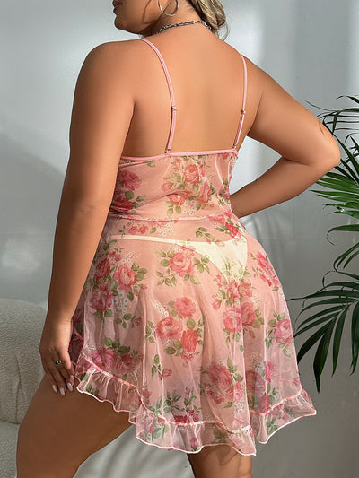 Back view of pink floral sheer babydoll with open-back straps and ruffled hem