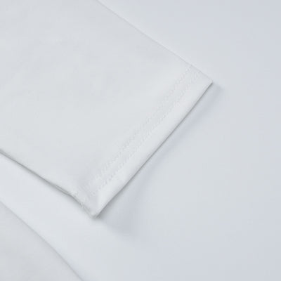 White maxi dress fabric close-up with neat topstitching seam detail