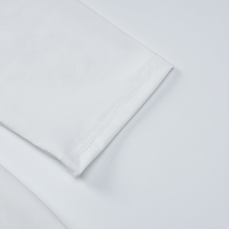 White maxi dress fabric close-up with neat topstitching seam detail