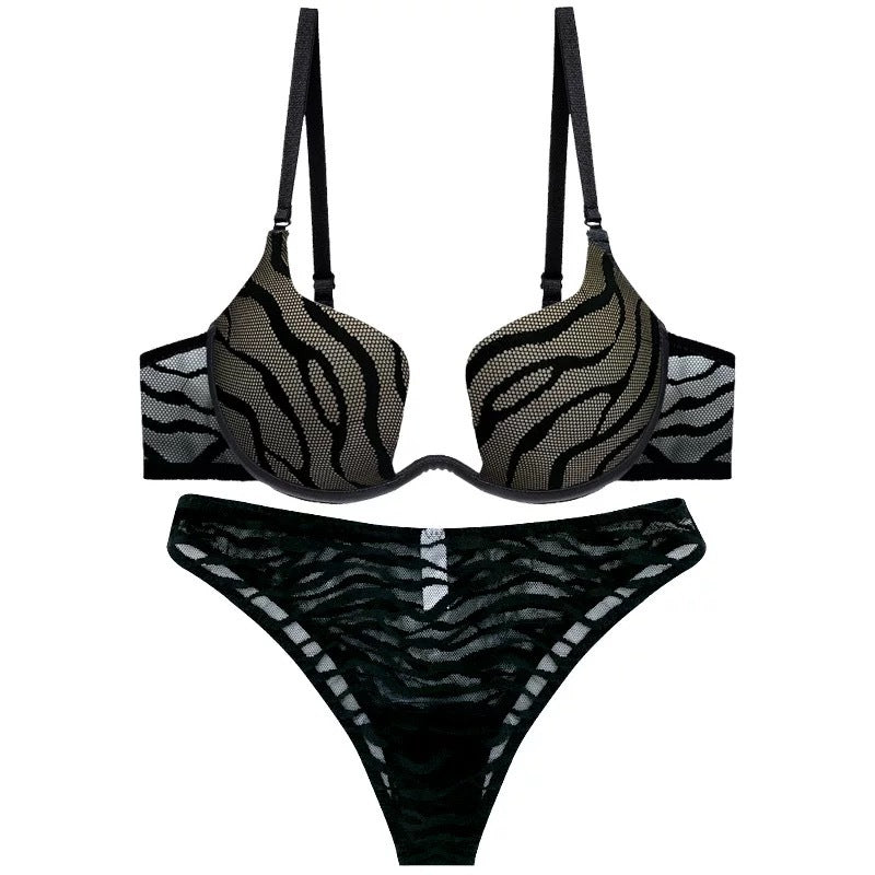 Black wavy mesh plunge bra and thong set with zebra-patterned texture