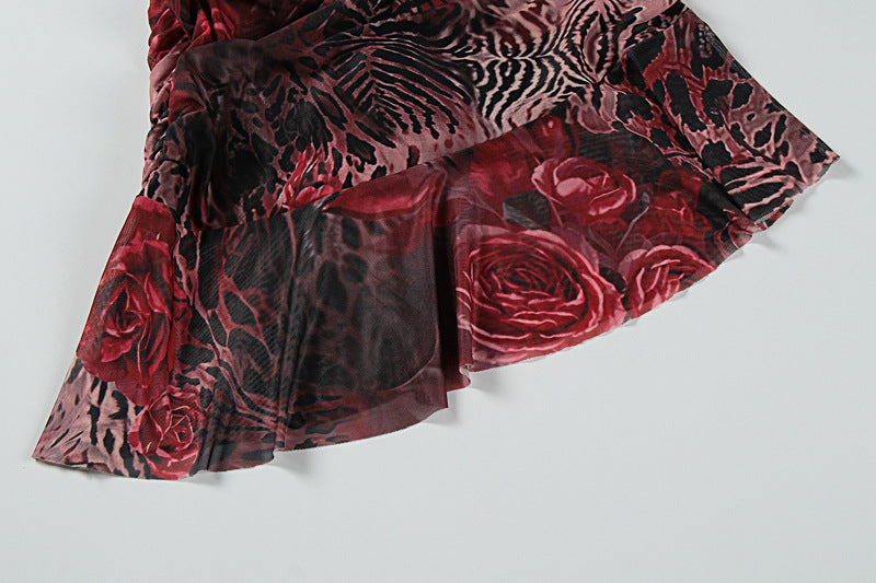 Ruched ruffle hem detail on mixed print mesh mini dress