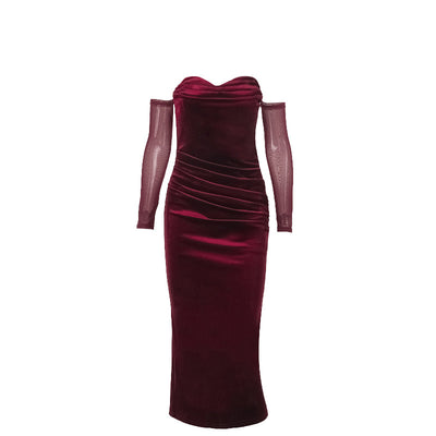 Burgundy one-shoulder suede pleated dress with long sheer sleeves and a mid-length straight skirt.