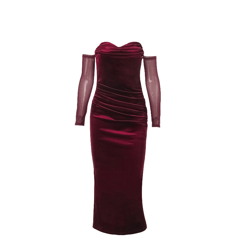 Burgundy one-shoulder suede pleated dress with long sheer sleeves and a mid-length straight skirt.