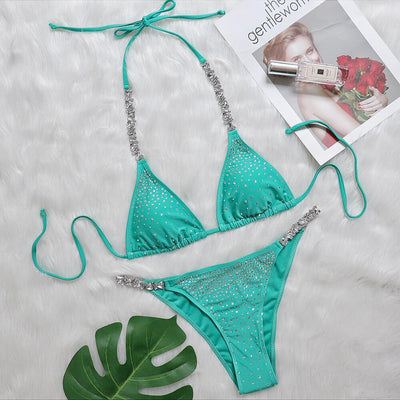Women's hot-stamped split swimsuit set in teal with silver-trim triangle top and bottoms