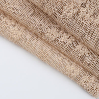 Khaki lace crop top fabric close-up with airy openwork texture