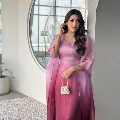Ombre satin maxi dress with sheer draped batwing sleeves, pink-magenta ombre