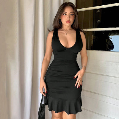 Black sleeveless ruched mini dress with scoop neckline and flounced hem, front view