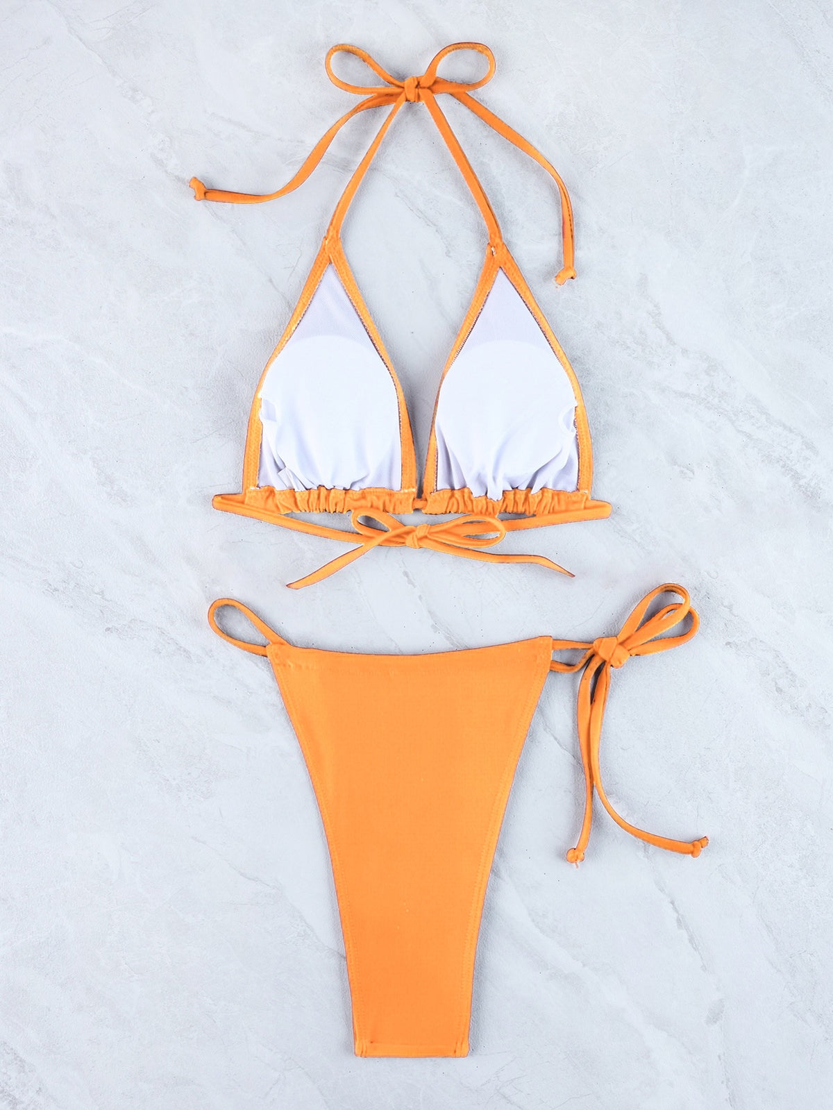 Halter triangle bikini set with orange triangle top and matching orange string bottoms