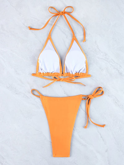 Halter triangle bikini set with orange triangle top and matching orange string bottoms