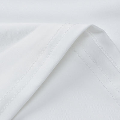 White maxi dress hem and seam close-up with visible stitching
