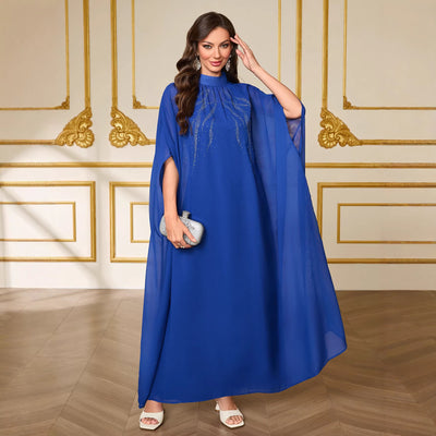 Two-piece gown dress in gemstone blue, high collar with airy draped cape sleeves