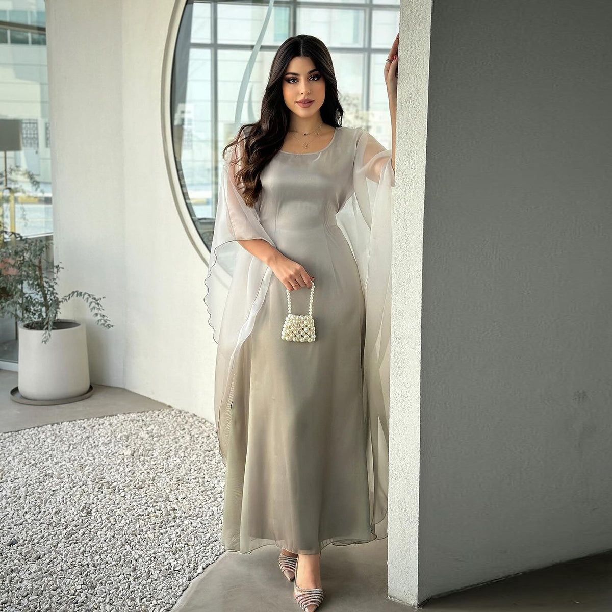 Ombre satin maxi dress with sheer batwing sleeves in light taupe, scoop neckline.