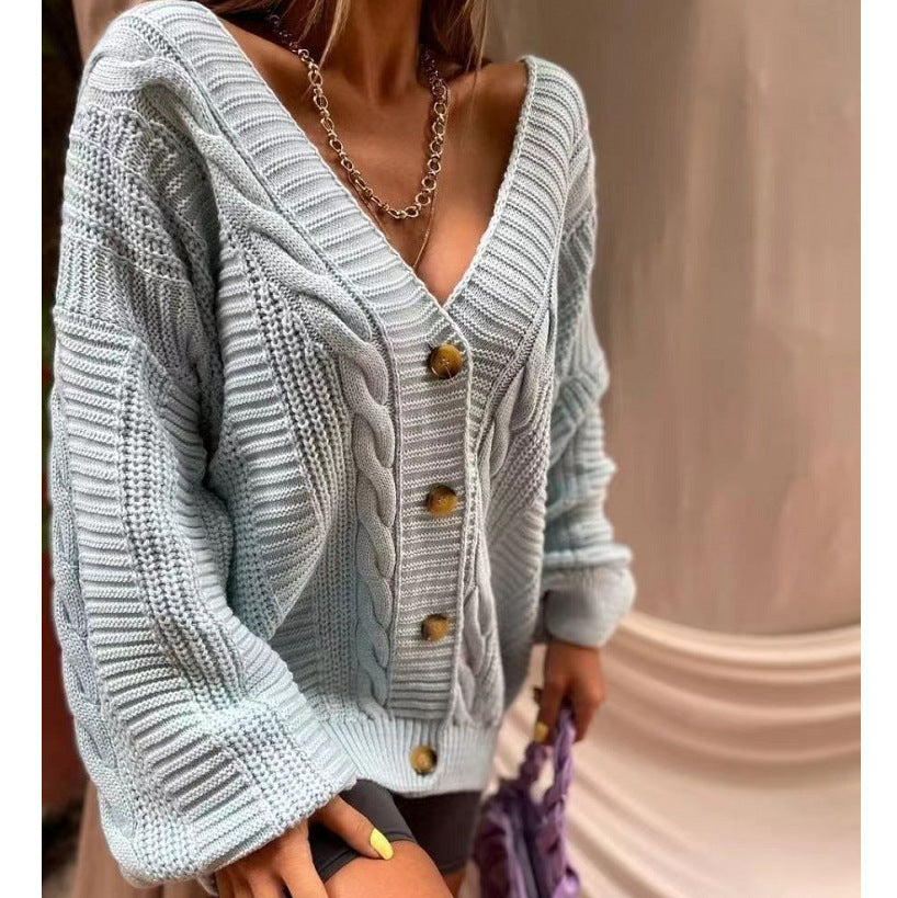 Women’s gray cable-knit cardigan with V-neck, button front, and lantern sleeves