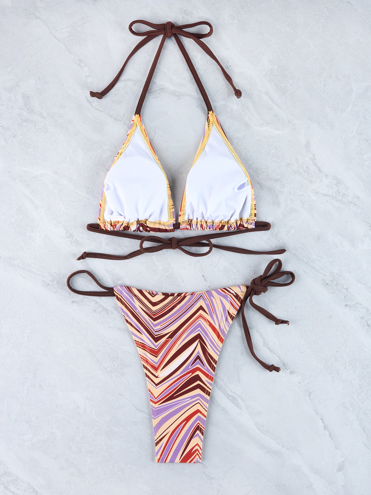 White and chevron-pattern halter triangle bikini set with string bottoms