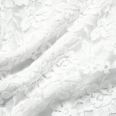 White lace bodysuit fabric close-up with intricate scalloped pattern