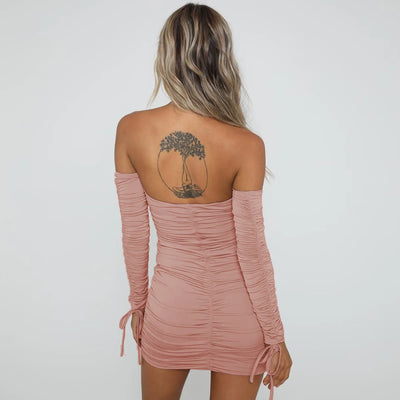 Rose pink off-shoulder ruched mini dress with long puff sleeves, angled back view