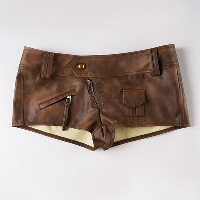 Brown leather-look low-rise shorts with zip fly and front pockets, belt loops.