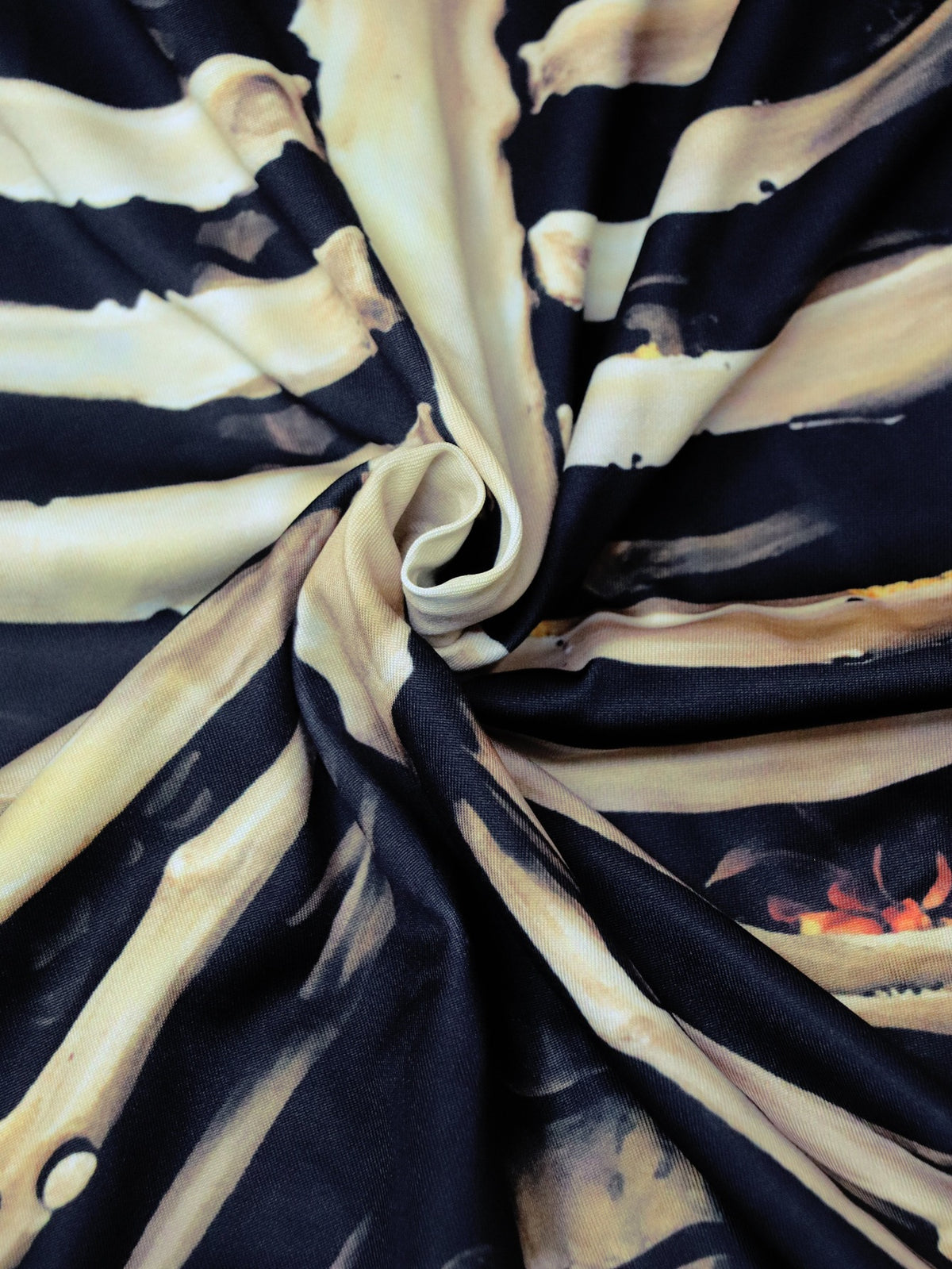 Black midi dress with beige skeleton print