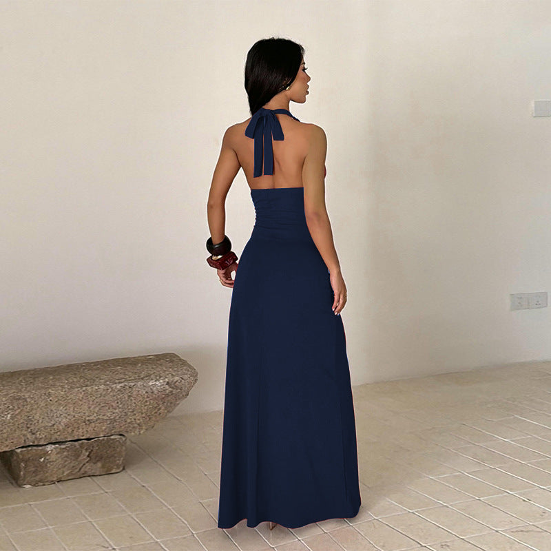Dark blue halter-neck maxi dress with open back straps and long side slit