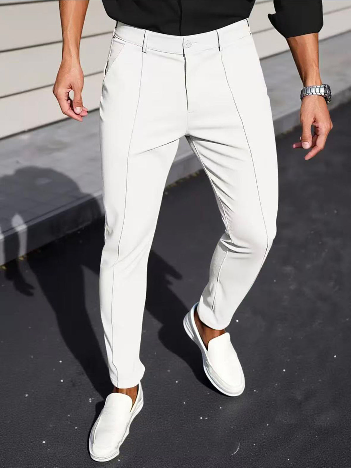 Men's slim-fit white dress pants with front seams and tapered ankle-length leg