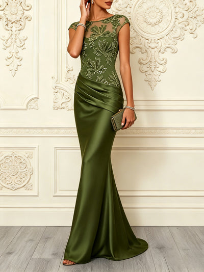 Olive green mermaid gown with floral mesh bodice and ruched waist