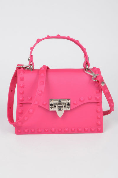 Monotone Studded Clutch bright pink top handle bag with shoulder strap silver turn lock and stud details
