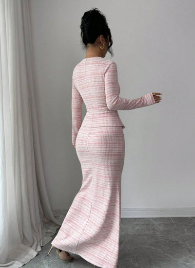 Back view of pink plaid peplum top and maxi skirt with flared hem