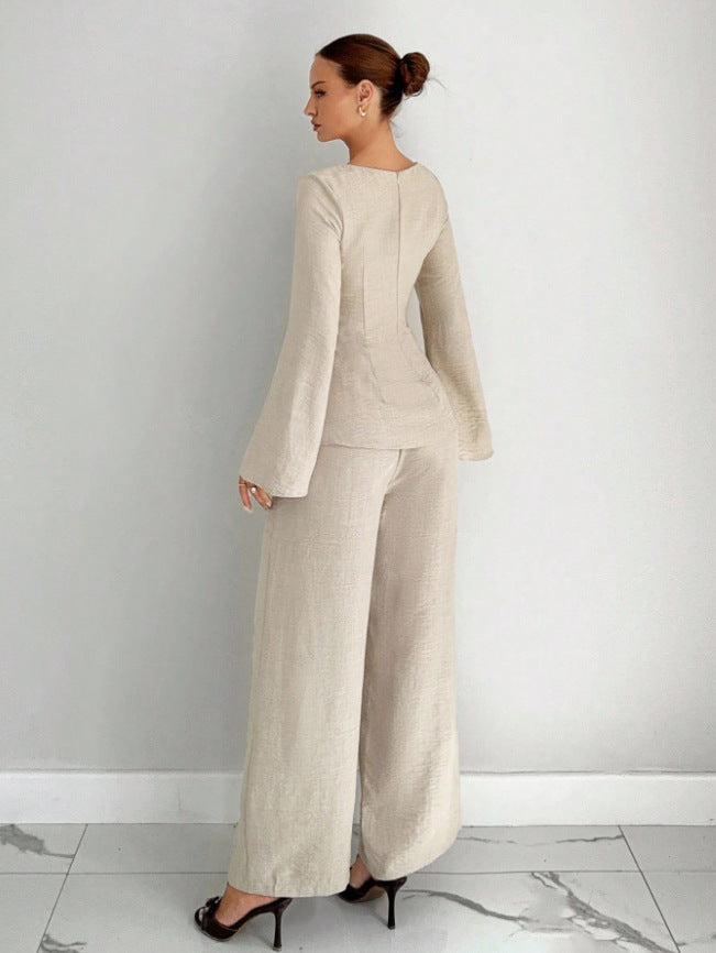Beige wide-leg pants set with shaped top and flared sleeves, full-length wide pants