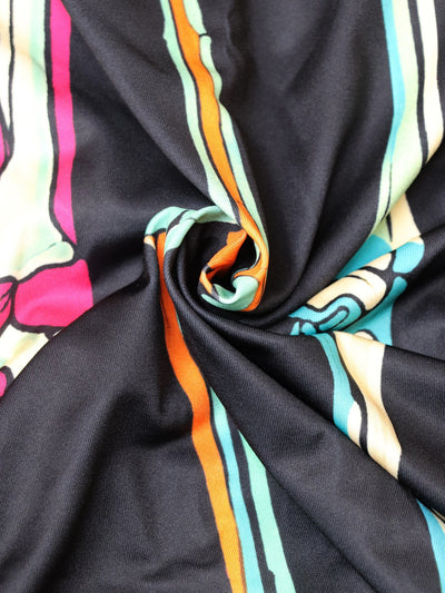 Black midi dress with colorful skeleton stripe print
