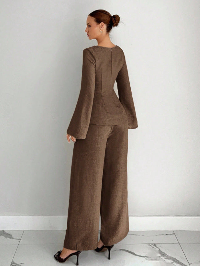 Beige/tan wide-leg pants set with long-sleeve shaped top and flared sleeves
