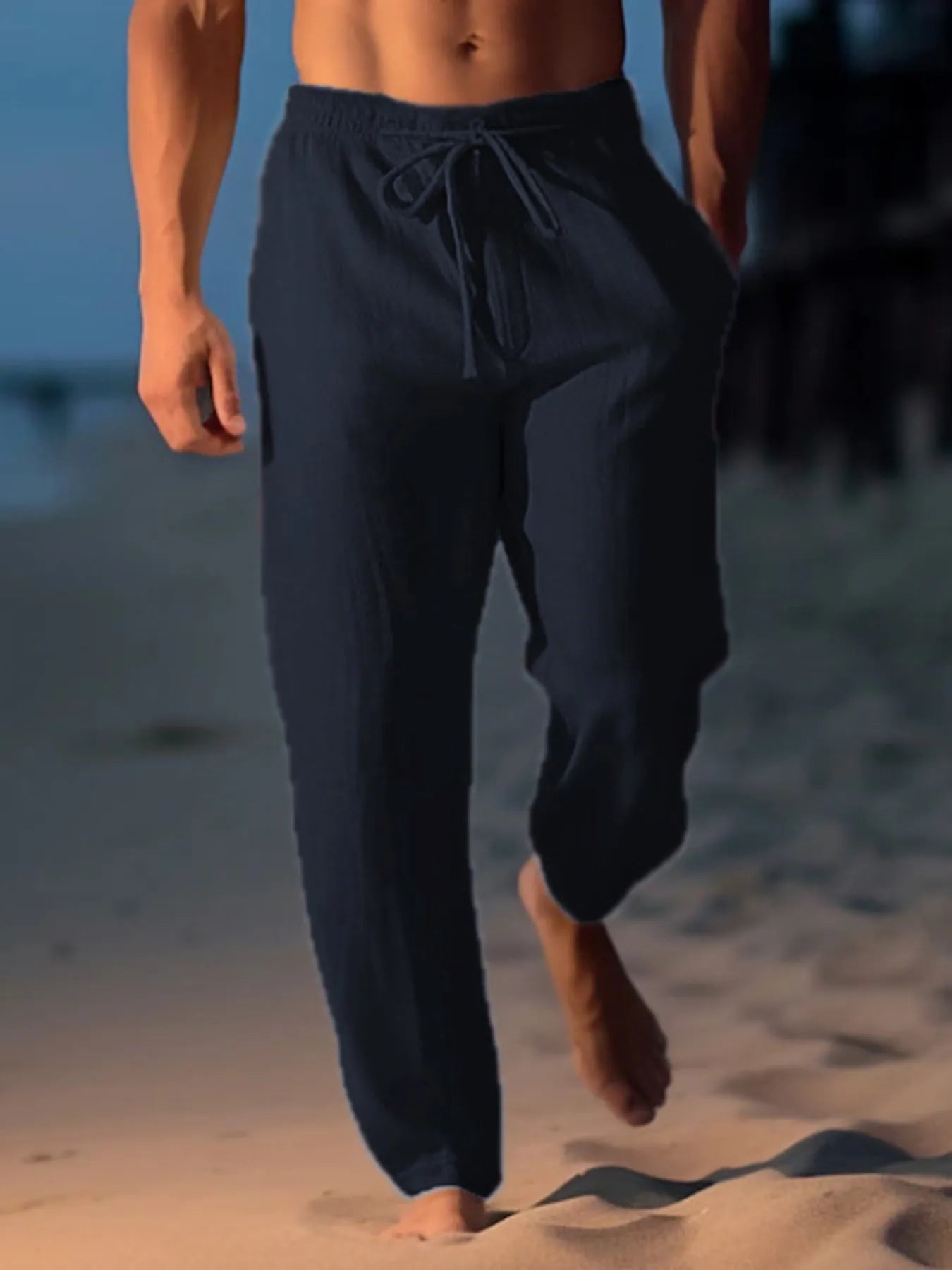 Men's black Drawstring Wide Leg Pants by Trendsi worn outdoors for casual comfort