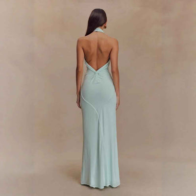 Elegant Formal Gown in light mint green with a stunning back design and halter neck