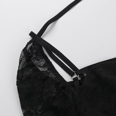 Black lace sleeve and shoulder straps with adjustable ring detail.