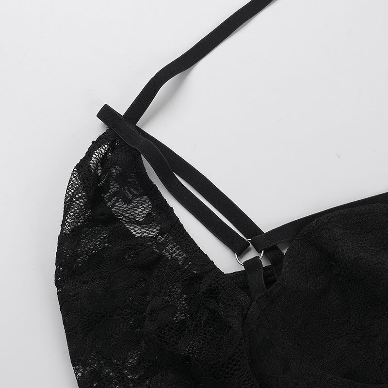 Black lace sleeve and shoulder straps with adjustable ring detail.
