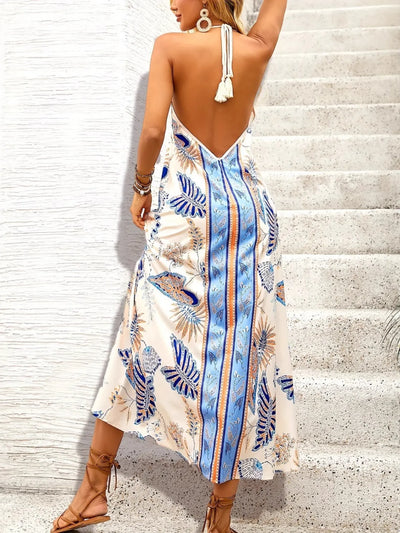 Back view of a Floral Print Maxi Dress with a deep V-back and tropical design, perfect for summer outings