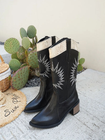 Trendsi black Point Toe Low Block boots with star design and beige trim on desert background