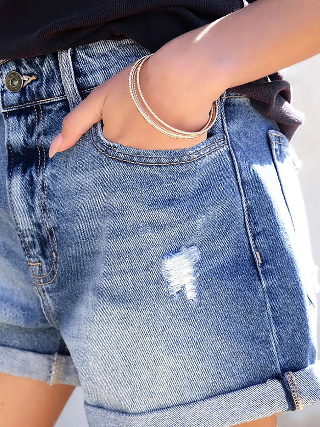 Trendsi light wash distressed denim shorts for women with cuffed hem and front pocket plus subtle ripped detail